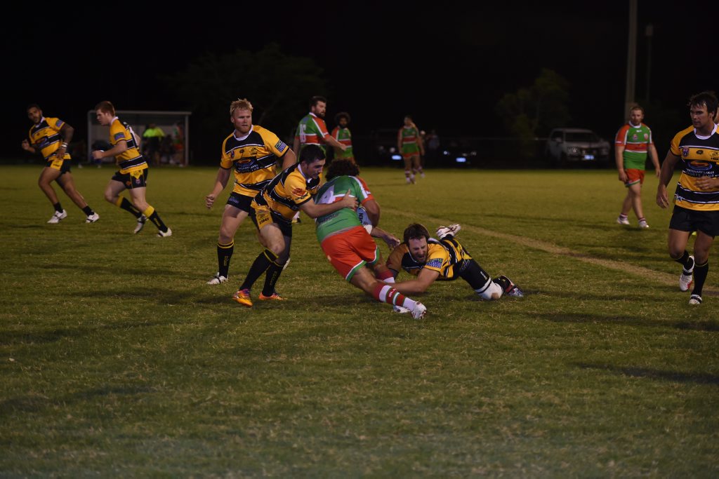 The Caboolture Snakes tackling Grayson Mallet from the Nambour Crushers